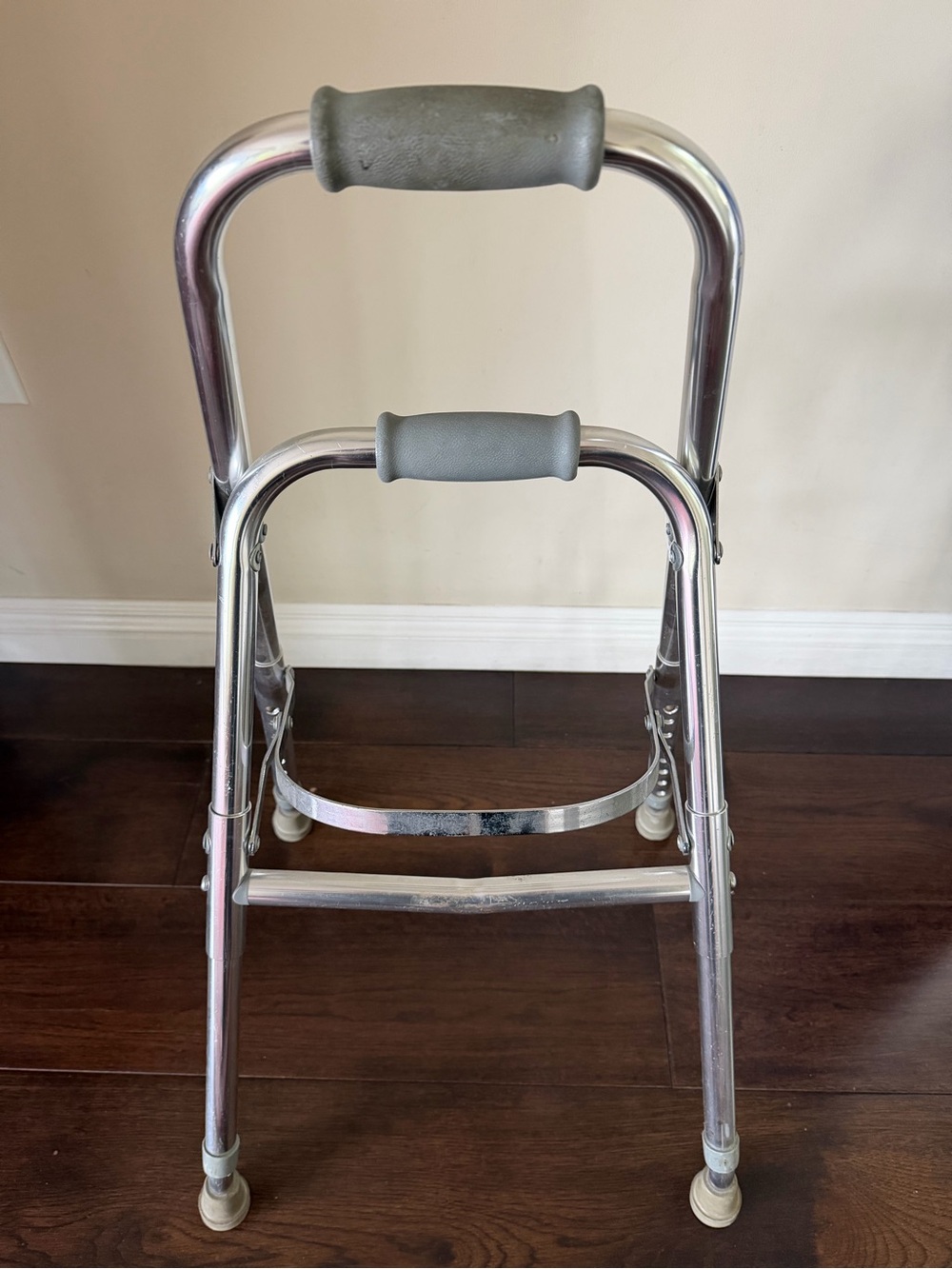 Adjustable Gray Folding Walker with Cushioned Hand Grips